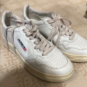 White AUTRY Sneakers with Retro Design and Perforations
